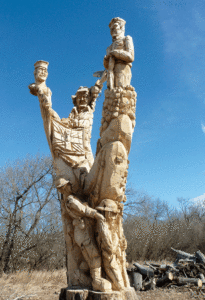 The Estevan Soldiers’ Tree pays homage to all Canadian veterans. Responding to a request from the city’s legion, Darren Jones carved the 102-year-old cottonwood with a chainsaw to honour veterans. The completed statue was moved to Estevan earlier this summer. (Photo Dominique Liboiron)